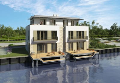 Auch als Doppelhaus verfügbar: Steghäuser am Wasser. Foto: Matrade Immobilien