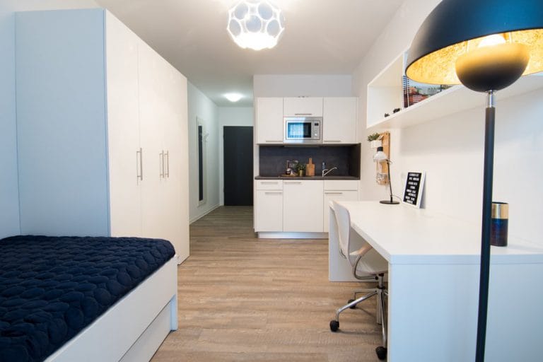 "Microapartments: housing for the future." – Title picture: inside a typical microapartment designed for student living – new build property development project "Studentenapartments Oestrich-Winkel" by Cube Real Estate.﻿